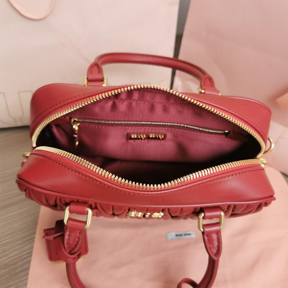 Matelasse nappa leather top-handle bag
